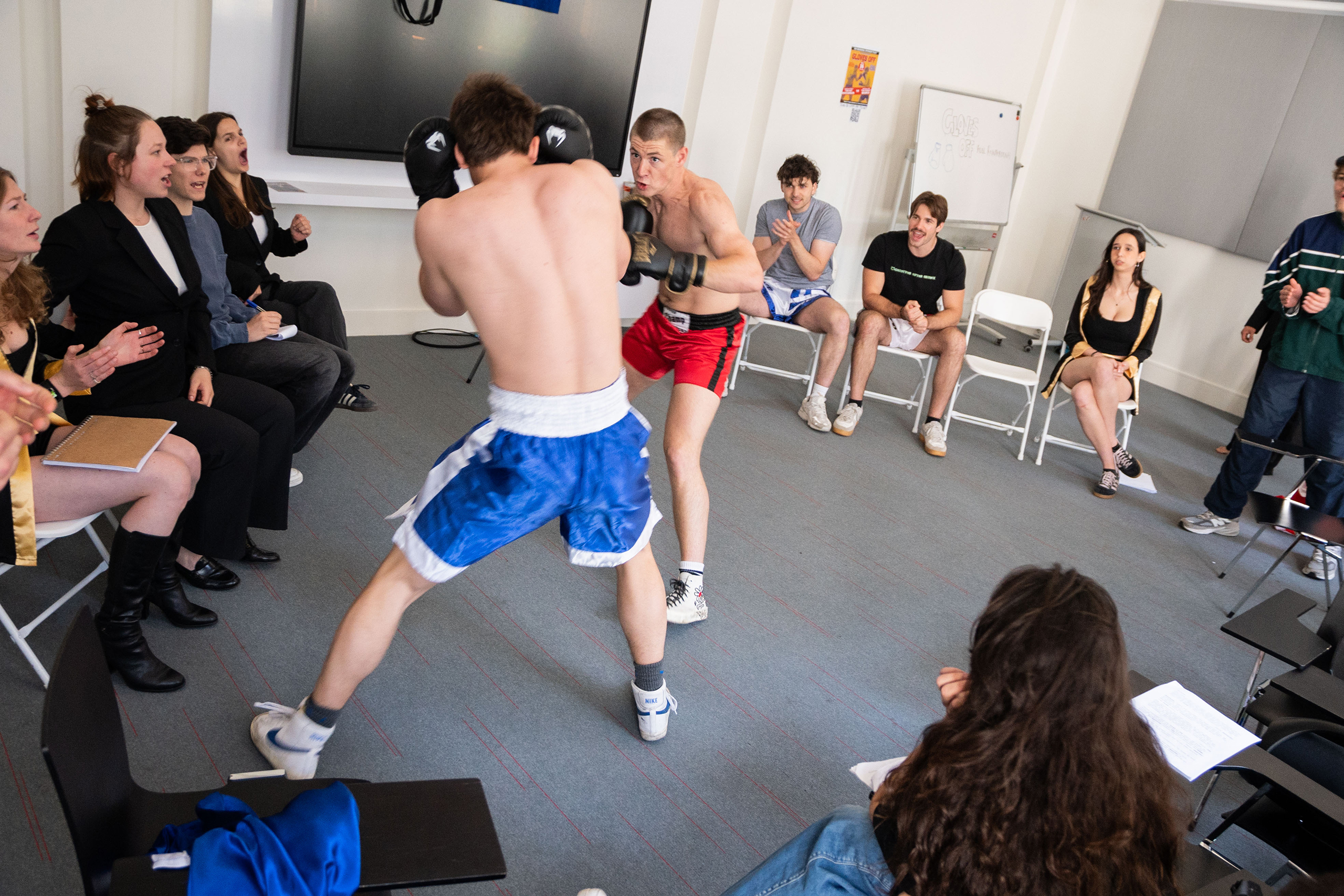 Gloves Off cast rehearsing a boxing scene