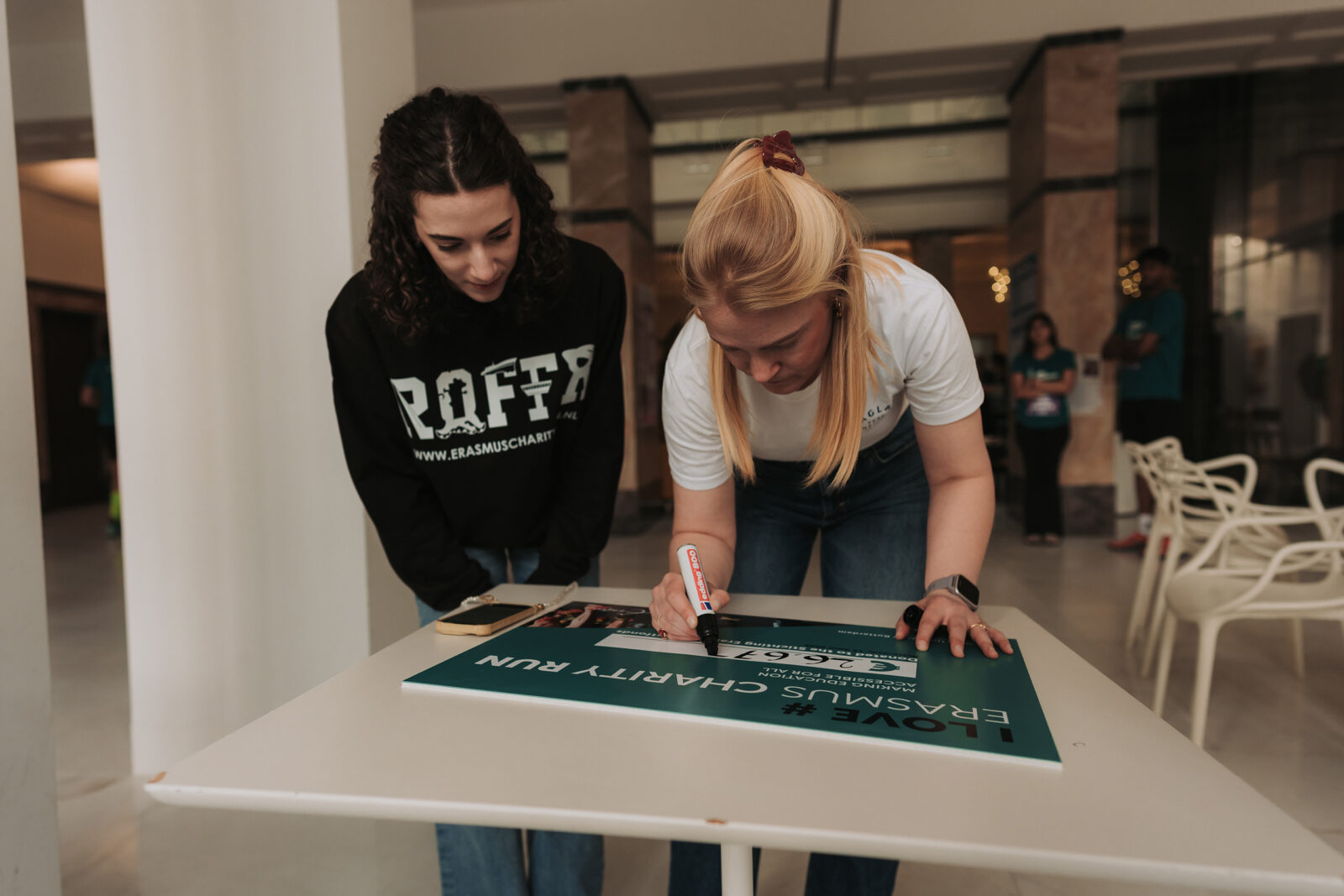 The amount raised is written on the check