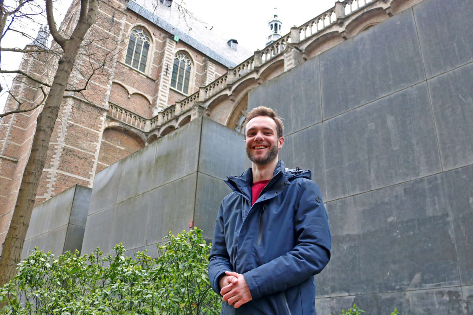 Student Maurits Verhoeven, the SGP’s lead candidate, in front of the Laurenskerk