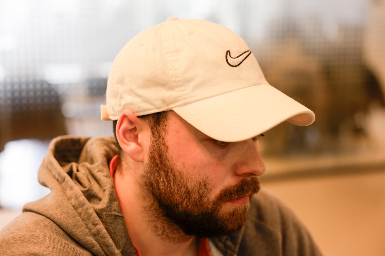 A close-up of Simon's cap