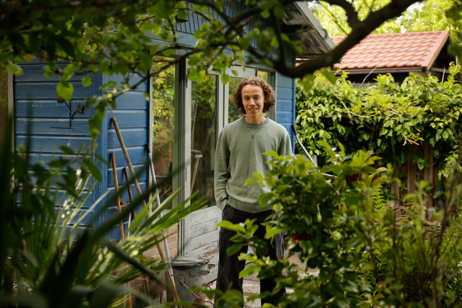 Finn van den Ijssel photographed through the trees