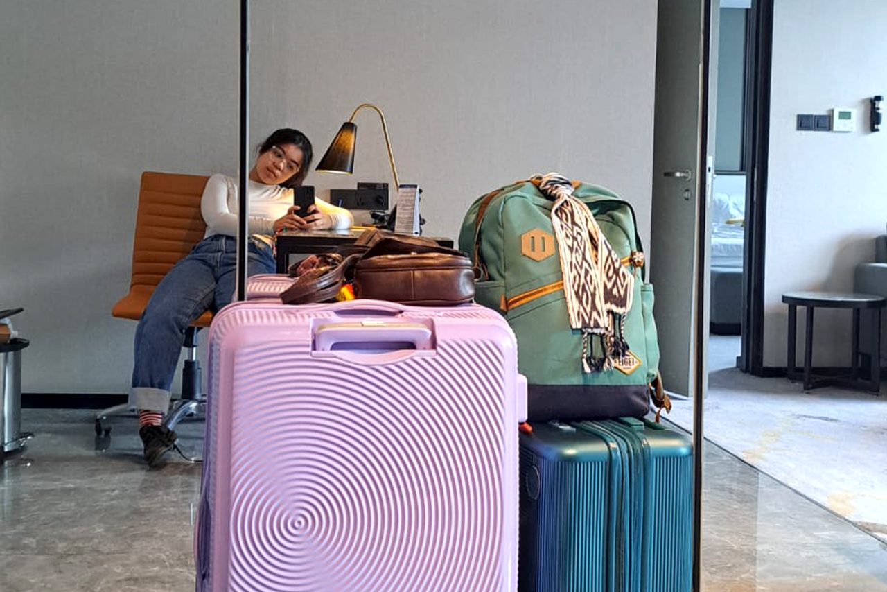 Saskia with her suitcases in Jakarta, before she knew what would happen next.